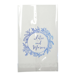 The Regal Wreath Bag design presents an elegant and abundant floral wreath, symbolizing luxury and nature's richness. Enclosed within this lush botanical embrace, the couple's names are elegantly scripted, adding a touch of royal sophistication. This design artfully marries opulence with the charm of natural abundance.