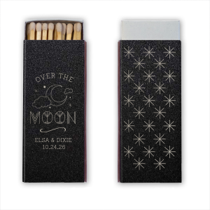 The Over the Moon Celestial Magic Match is a whimsical nod to 1960s art. The front displays an artistically vibrant crescent moon and stars. Below, the couple’s names and date are elegantly presented. The back is a celestial masterpiece, a detailed constellation drawing evoking the magic of starry skies, perfect for enchanting celebrations.
