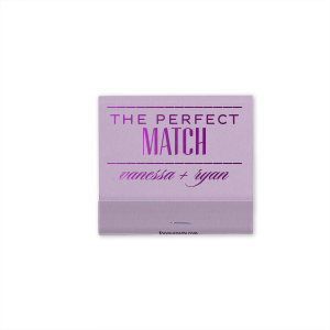 Light a spark of elegance with the The Perfect Matchbook, where art deco flair meets romantic prose. 'MATCH' stands bold and accented, while the couple's names whisper below in a delicate script, striking a timeless harmony.