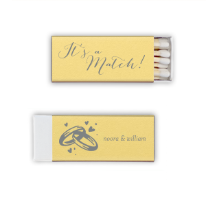 Ignite serendipity with the It’s a Match Matchbox, flaunting love's fate in graceful script. Twinkling bands and hearts on the back, plus the couple's names, celebrate a match made in bliss.