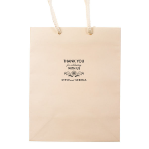 Express heartfelt thanks with the Floral Thank You Wedding Gift Bag, adorned with hand-drawn blooms and a sincere stacked message. This energetic design, featuring the couple's names, offers a sweet token of appreciation for your cherished guests.