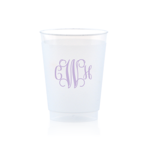 The Artistic Flourish Vine Monogram Frosted Cup design elegantly showcases a monogram of intertwined vine-like flourishes. This complex, artistic, design invites a closer look to decipher the initials, making a sophisticated and decorative statement that reflects the couple's unique style and penchant for flair.