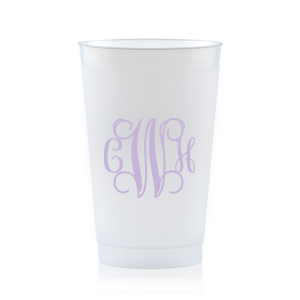 The Artistic Flourish Vine Monogram Frosted Cup design elegantly showcases a monogram of intertwined vine-like flourishes. This complex, artistic, design invites a closer look to decipher the initials, making a sophisticated and decorative statement that reflects the couple's unique style and penchant for flair.