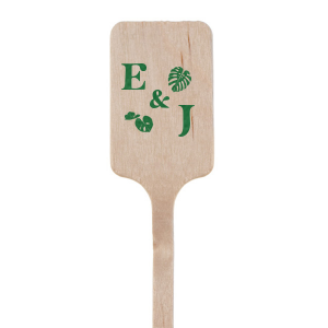 The Tropical True Love Initials Stir Stick brings the lush vibrancy of the tropics to your celebration, featuring your initials encircled by an array of exotic leaf graphics. The initials themselves are inscribed in a relaxed and breezy script that captures the laid-back essence of a sun-kissed getaway. This personalized stirrer is a fresh addition to any event, inviting guests to sip and savor the spirit of paradise.