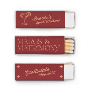 Add a dash of flair to the bachelorette festivities with the Margs and Matrimony Bachelorette Party Lipstick Matchbox, tailored with the bride-to-be's name, and the celebratory details, alongside a hand-drawn margarita and stars. A modern must-have for a sizzling bachelorette bash.