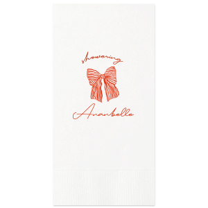 Celebrate the bride-to-be with the Showering Love Bow Napkin, delicately personalized with her name in a romantic script, alongside the word "showering" and a stylish bow graphic. An elegant choice for a chic and trendy bridal shower.