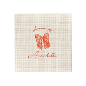 Celebrate the bride-to-be with the Showering Love Bow Napkin, delicately personalized with her name in a romantic script, alongside the word "showering" and a stylish bow graphic. An elegant choice for a chic and trendy bridal shower.