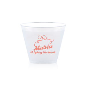 Sip in celebration with the Bow & Bliss Bridal Cup, ideal for a bridal shower or bachelorette party, personalized with the bride-to-be's name and the sweet sentiment "is tying the knot," accented by a romantic and chic bow graphic.