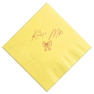 Infuse your wedding with a touch of rustic charm with the Rustic Bow Matrimony Napkin, customizable with the couple's names. The hand-drawn bow graphic adds a quaint and heartfelt detail to your nuptial celebrations.