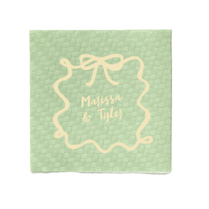 Frame your celebration with the Bows and Vows Frame Napkin, featuring the couple's names encased in an elegant bow and ribbon frame. A beautiful addition to any wedding, engagement party, or anniversary gathering.
