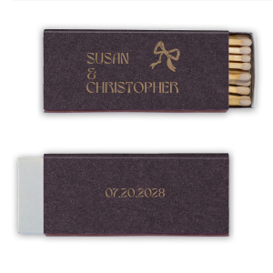 Ignite a lifetime of memories with the Modern Names and Date Bow Matchbox, personalized with the couple's names and the date of your event, complemented by a hand-drawn bow graphic. A charming keepsake for weddings, engagement parties, or anniversaries.