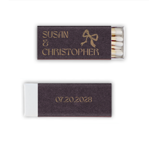 Ignite a lifetime of memories with the Modern Names and Date Bow Matchbox, personalized with the couple's names and the date of your event, complemented by a hand-drawn bow graphic. A charming keepsake for weddings, engagement parties, or anniversaries.