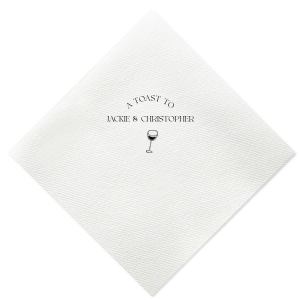 Raise your glasses with the A Toast To Wine Glass Napkin, featuring the phrase "A Toast to" arched gracefully above the couple's names, and a chic single line drawing of a wine glass below. Perfect for adding a bespoke touch to your wedding or rehearsal dinner.