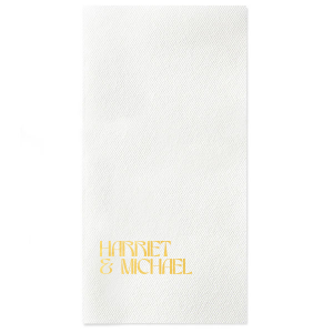 Celebrate your special day with the Marital Elegance Napkin, featuring the couple's names in a sophisticated and art deco inspired type that exudes modern elegance. A stylish and personal addition to your wedding reception.