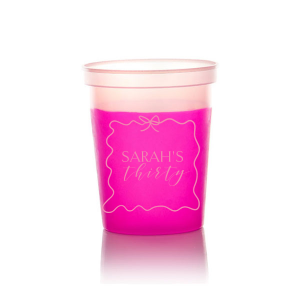 Sip in style at your birthday bash with the Ribbon Frame Birthday Bash Cup, elegantly framed like a ribbon and bow, featuring your name and new age in a whimsical script. A festive and personalized touch to celebrate another fabulous year.