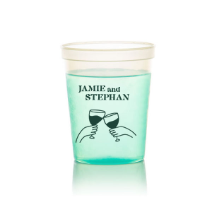 Toast to togetherness with the Cheers to Love Line Art Cup, custom-crafted with the couple's names above a minimalist line drawing of two hands clinking wine glasses. An elegant symbol of celebration for your wedding day.