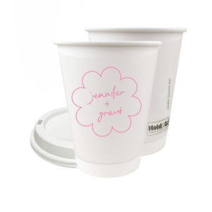 Sip in style at your whimsical wedding with the Kitschy Cocktail Hour Floral Frame Cup. Personalize this charming vessel with the couple's names, elegantly scripted within a blooming flower-shaped frame. A modern and enchanting choice for your celebratory toasts.