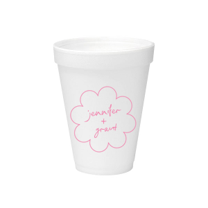 Sip in style at your whimsical wedding with the Kitschy Cocktail Hour Floral Frame Cup. Personalize this charming vessel with the couple's names, elegantly scripted within a blooming flower-shaped frame. A modern and enchanting choice for your celebratory toasts.