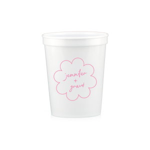 Sip in style at your whimsical wedding with the Kitschy Cocktail Hour Floral Frame Cup. Personalize this charming vessel with the couple's names, elegantly scripted within a blooming flower-shaped frame. A modern and enchanting choice for your celebratory toasts.