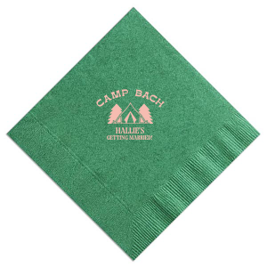 Gather around the campfire with the Camp Bachelorette Wilderness Napkin, personalized with "Camp Bach" arching over a charming tent and trees graphic, and the bachelorette's name prominently displayed below. A rustic yet chic touch to any outdoor bachelorette adventure.