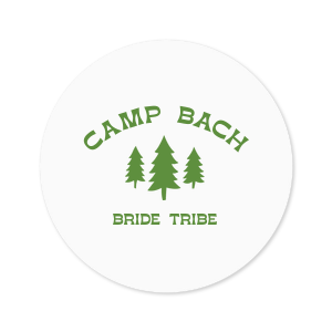 Label your bachelorette party essentials with the Camp Bachelorette Wilderness Label, featuring a serene forest scene topped with "Camp Bach" in an arch, evoking the spirit of adventure. An ideal accent for your camp themed bachelorette getaway.