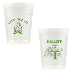 Gather around the bonfire with the Camp Bachelorette Last Trail Cup, featuring a lively campfire graphic paired with the cheeky phrase let's Get Lit, and a trailhead arrow dressed in a veil on the reverse, proclaiming "Last Trail Before the Veil." Customize with the bachelorette's name for a memento that captures the spirit of her final single days in the great outdoors.