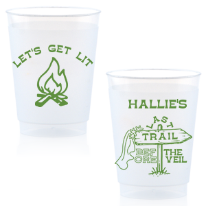 Gather around the bonfire with the Camp Bachelorette Last Trail Cup, featuring a lively campfire graphic paired with the cheeky phrase let's Get Lit, and a trailhead arrow dressed in a veil on the reverse, proclaiming "Last Trail Before the Veil." Customize with the bachelorette's name for a memento that captures the spirit of her final single days in the great outdoors.