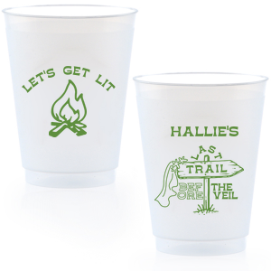 Gather around the bonfire with the Camp Bachelorette Last Trail Cup, featuring a lively campfire graphic paired with the cheeky phrase let's Get Lit, and a trailhead arrow dressed in a veil on the reverse, proclaiming "Last Trail Before the Veil." Customize with the bachelorette's name for a memento that captures the spirit of her final single days in the great outdoors.