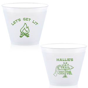 Gather around the bonfire with the Camp Bachelorette Last Trail Cup, featuring a lively campfire graphic paired with the cheeky phrase let's Get Lit, and a trailhead arrow dressed in a veil on the reverse, proclaiming "Last Trail Before the Veil." Customize with the bachelorette's name for a memento that captures the spirit of her final single days in the great outdoors.