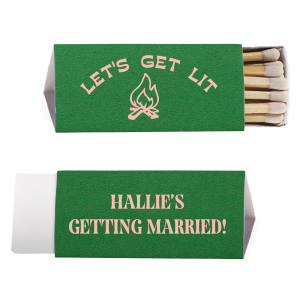 Spark the excitement of the great outdoors with the Camp Bachelorette Let's Get Lit Matchbook, igniting the party spirit with a campfire graphic and vibrant catchphrase on one side. Personalize the other with the bachelorette's name for a playful and practical keepsake from her wilderness celebration.