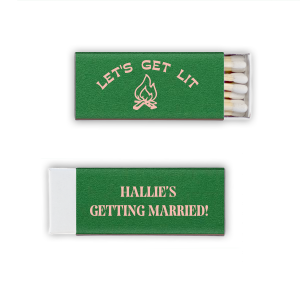 Spark the excitement of the great outdoors with the Camp Bachelorette Let's Get Lit Matchbook, igniting the party spirit with a campfire graphic and vibrant catchphrase on one side. Personalize the other with the bachelorette's name for a playful and practical keepsake from her wilderness celebration.