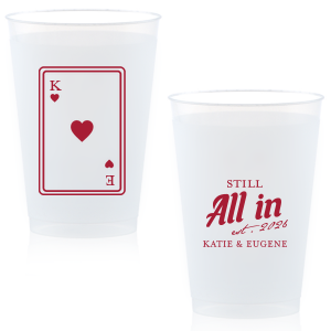 Celebrate lasting love with the Playing Card Still All In Anniversary Cup. One side adorns a hearts playing card graphic, personalized with your initials. The other side is inscribed with "Still All In," alongside the celebratory year and the couple's names, symbolizing a winning hand in marriage.