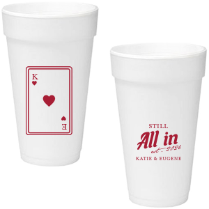 Celebrate lasting love with the Playing Card Still All In Anniversary Cup. One side adorns a hearts playing card graphic, personalized with your initials. The other side is inscribed with "Still All In," alongside the celebratory year and the couple's names, symbolizing a winning hand in marriage.