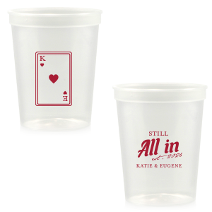 Celebrate lasting love with the Playing Card Still All In Anniversary Cup. One side adorns a hearts playing card graphic, personalized with your initials. The other side is inscribed with "Still All In," alongside the celebratory year and the couple's names, symbolizing a winning hand in marriage.