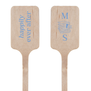Stir your celebratory drinks with the Happily Ever After Stir Stick, inscribed with the timeless phrase on one side. Flip to personalize with the couple's initials, flanked by an illustrative stack of books—an homage to the chapters of their unique love story.