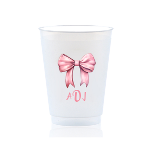 Invite the Illustrated Bow Monogram Cup to your next event! Featuring a pink bow, you can personalize with your monogram for a birthday party, baby shower, gender reveal party, and more. 