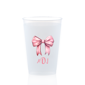 Invite the Illustrated Bow Monogram Cup to your next event! Featuring a pink bow, you can personalize with your monogram for a birthday party, baby shower, gender reveal party, and more. 