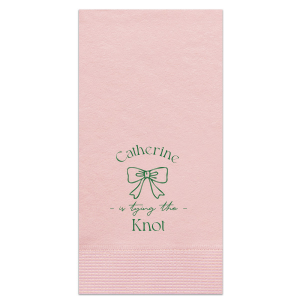 Set a scene of romance and anticipation with the Romantic Bow Bridal Shower Napkin, delicately personalized with the bride's name hovering above a graphic of an elegant bow, followed by "Tying the Knot" in a sleek, modern script. The perfect blend of love and style for her special day.