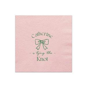 Set a scene of romance and anticipation with the Romantic Bow Bridal Shower Napkin, delicately personalized with the bride's name hovering above a graphic of an elegant bow, followed by "Tying the Knot" in a sleek, modern script. The perfect blend of love and style for her special day.
