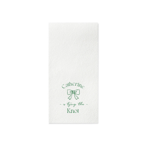 Set a scene of romance and anticipation with the Romantic Bow Bridal Shower Napkin, delicately personalized with the bride's name hovering above a graphic of an elegant bow, followed by "Tying the Knot" in a sleek, modern script. The perfect blend of love and style for her special day.