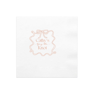 Celebrate the bride-to-be with the Ribbon Frame Tying the Knot Napkin, featuring her name elegantly placed above the phrase Tying the Knot in a contemporary script. Enclosed by a looping ribbon frame with a neat bow, this napkin adds a sophisticated and whimsical touch to her bridal shower.