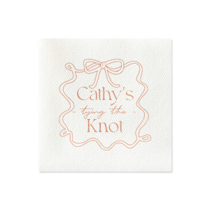 Celebrate the bride-to-be with the Ribbon Frame Tying the Knot Napkin, featuring her name elegantly placed above the phrase Tying the Knot in a contemporary script. Enclosed by a looping ribbon frame with a neat bow, this napkin adds a sophisticated and whimsical touch to her bridal shower.