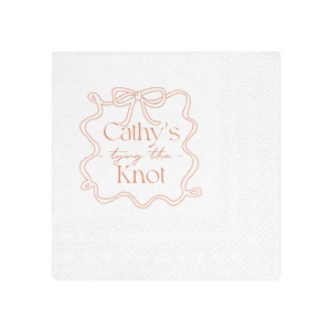 Celebrate the bride-to-be with the Ribbon Frame Tying the Knot Napkin, featuring her name elegantly placed above the phrase Tying the Knot in a contemporary script. Enclosed by a looping ribbon frame with a neat bow, this napkin adds a sophisticated and whimsical touch to her bridal shower.