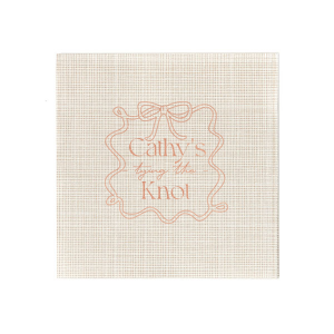 Celebrate the bride-to-be with the Ribbon Frame Tying the Knot Napkin, featuring her name elegantly placed above the phrase Tying the Knot in a contemporary script. Enclosed by a looping ribbon frame with a neat bow, this napkin adds a sophisticated and whimsical touch to her bridal shower.
