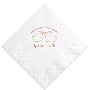 Hop into matrimonial joy with the Some Bunnies Wedding Napkin, complete with an adorable drawing of two bunnies and a heart nestled between them. The playful phrase "Some Bunnies Getting Married" sets a whimsical tone, while the area below awaits the couple's names, scripted with modern elegance. A delightful addition to your wedding tablescapes.