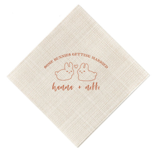 Hop into matrimonial joy with the Some Bunnies Wedding Napkin, complete with an adorable drawing of two bunnies and a heart nestled between them. The playful phrase "Some Bunnies Getting Married" sets a whimsical tone, while the area below awaits the couple's names, scripted with modern elegance. A delightful addition to your wedding tablescapes.