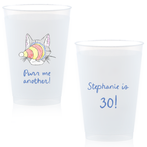 Embrace the festivity with the Purr Me Another Birthday Cup, featuring a vibrant illustration of a cat's face whimsically obscured by a party hat. The playful phrase "Purr me another." invites a celebratory mood, while the opposite side offers a space to customize with the name and age of the guest of honor, whether they're a person or a cherished pet.