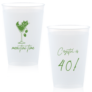 Toast to another fabulous year with the Meowtini Time Birthday Cup, showcasing a whimsical drawing of a cat cozily perched in a martini glass, olives playfully cascading over the rim. Personalize with your name and milestone age to the right of the glass in an elegant script font, inviting a celebratory sip with feline flair.