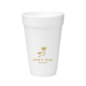 Cheers to love with the Toasting Hands Wedding Cup, adorned with a delightful cartoon hand raising a glass of wine in celebration. Beneath this charming graphic, add a personal touch with the couple's names in a playful script font, followed by the event date in a classic serif. A delightful addition to your wedding day festivities.