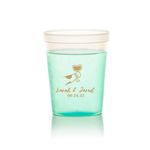 Cheers to love with the Toasting Hands Wedding Cup, adorned with a delightful cartoon hand raising a glass of wine in celebration. Beneath this charming graphic, add a personal touch with the couple's names in a playful script font, followed by the event date in a classic serif. A delightful addition to your wedding day festivities.